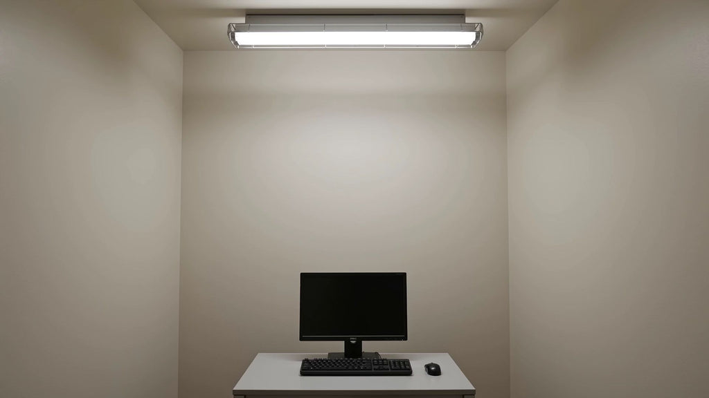 PulseGlow LED Light Bars — before: plain desk setup under flat overhead light