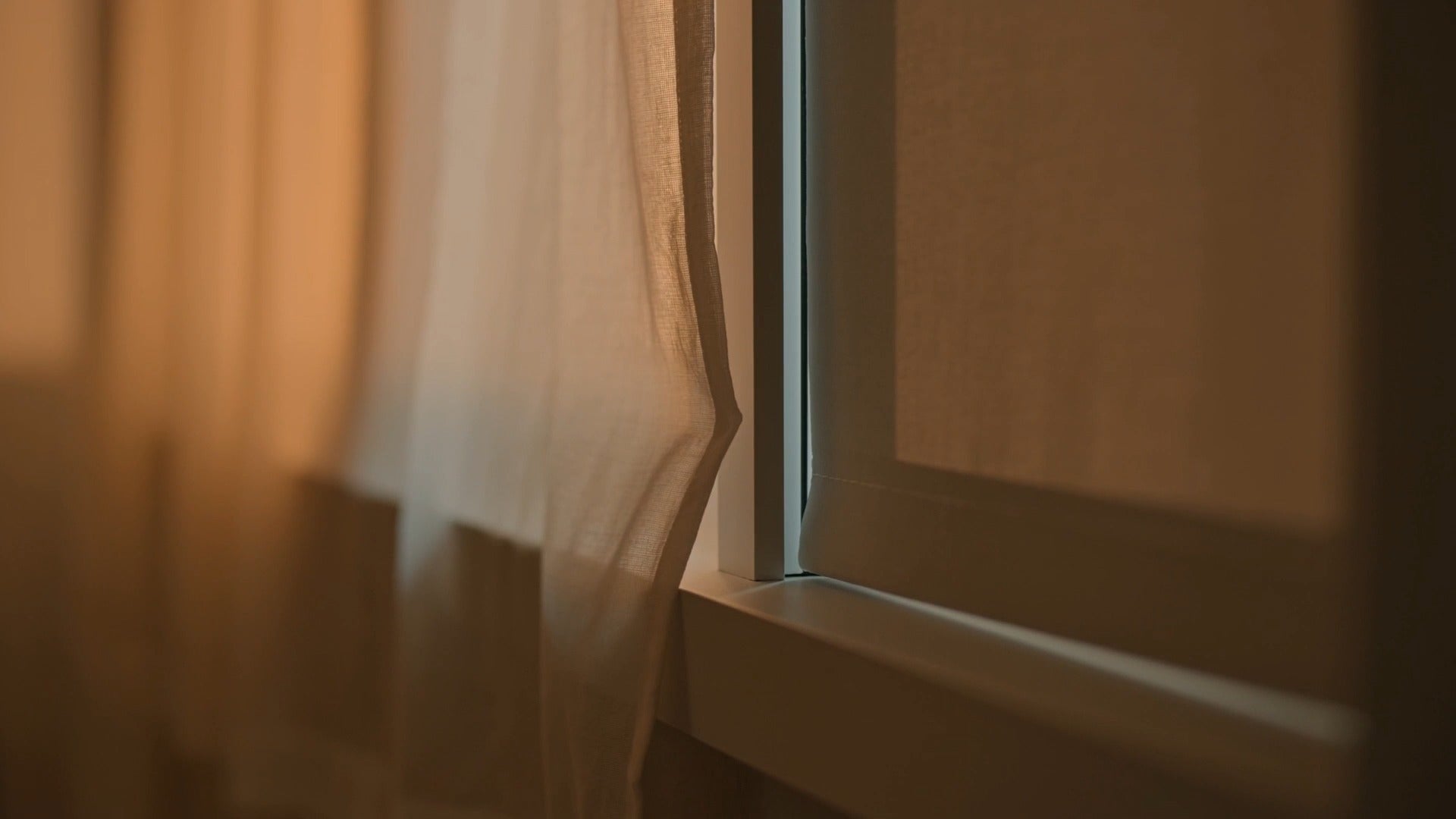 SnapSeal Draft Strips — before: drafty window with visible gap letting in cold air